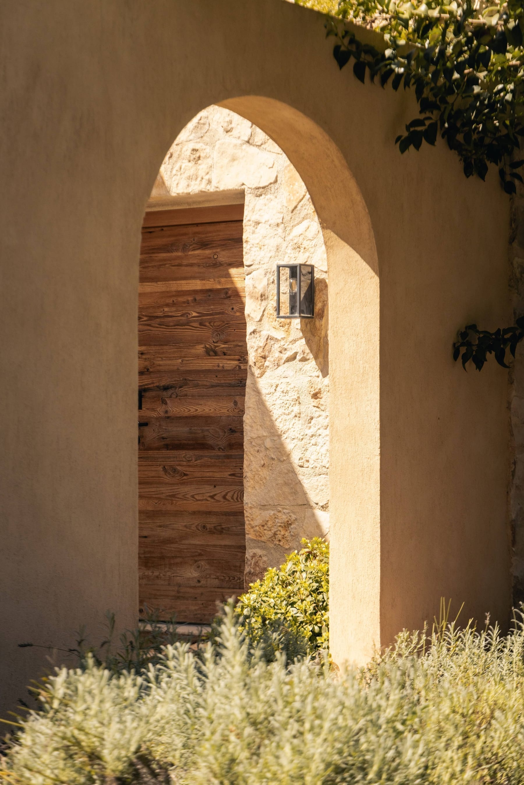 Stone terrace and Provençal gardens at Toile Blanche